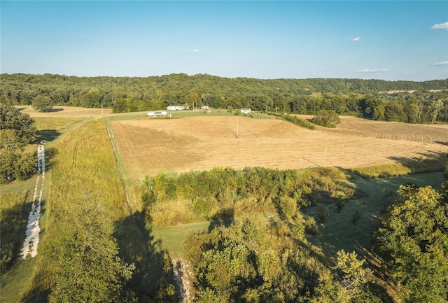 birds eye view of property featuring a rural view