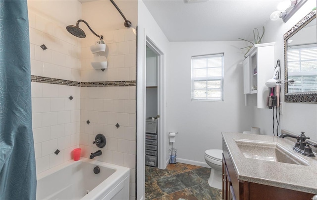 full bathroom featuring vanity, shower / bathtub combination with curtain, and toilet