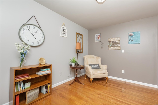 living area with light hardwood / wood-style floors