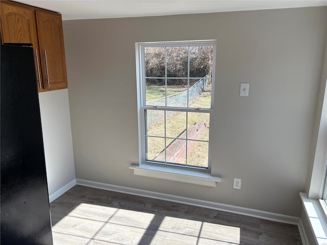 unfurnished dining area featuring light hardwood / wood-style flooring