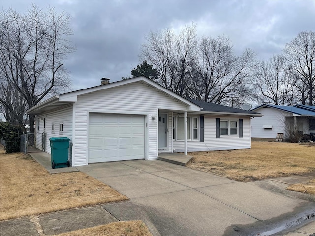 single story home featuring a garage