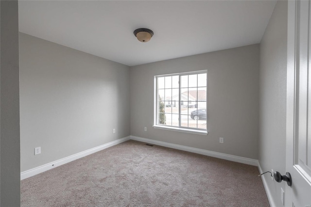 view of carpeted spare room