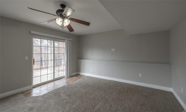 empty room with light colored carpet and ceiling fan