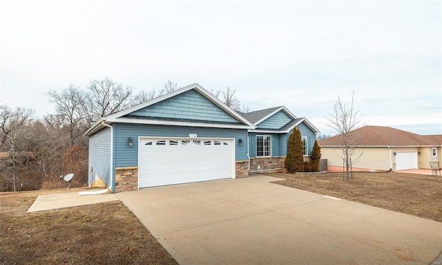 view of front of house with a garage and a front lawn