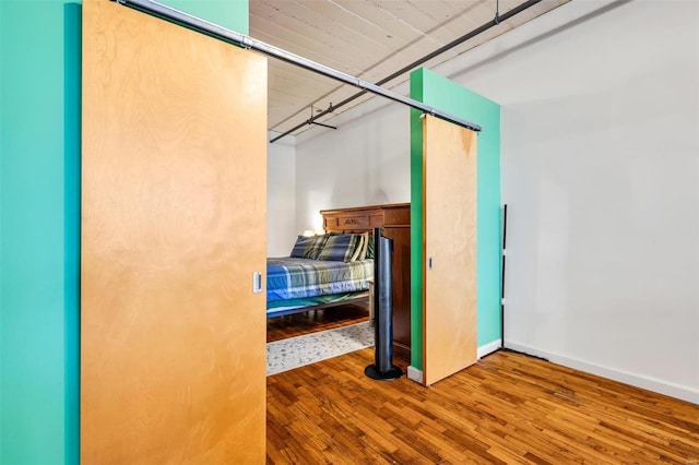 bedroom featuring hardwood / wood-style floors