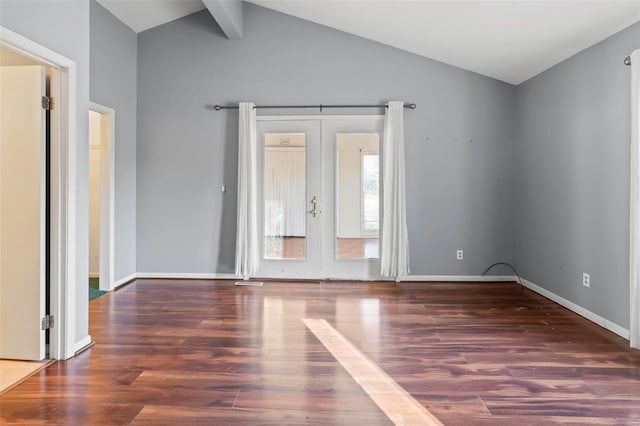 unfurnished room featuring vaulted ceiling with beams, french doors, dark wood-style flooring, and baseboards