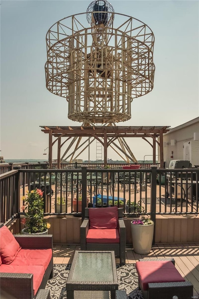 balcony featuring a pergola