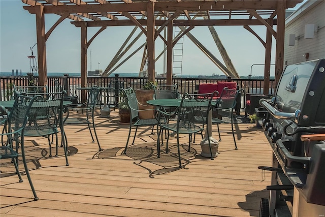 wooden deck featuring a pergola