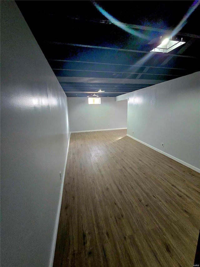 basement with wood-type flooring