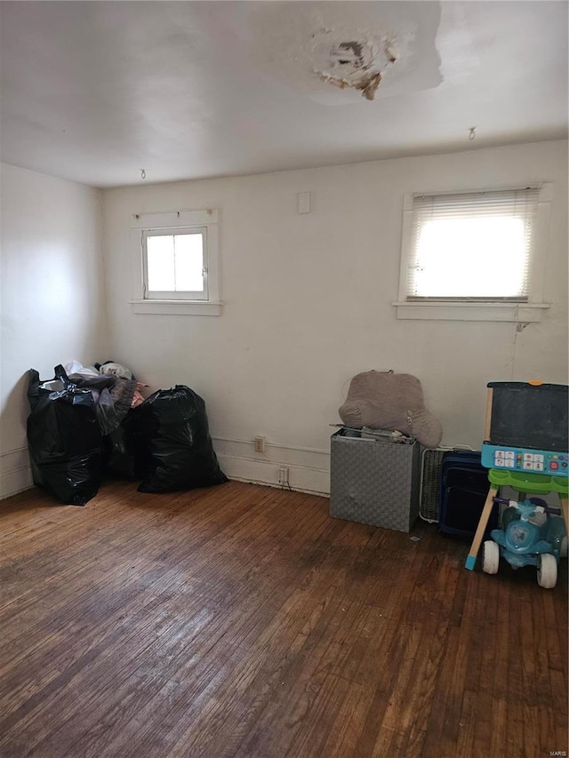 misc room with dark wood-type flooring