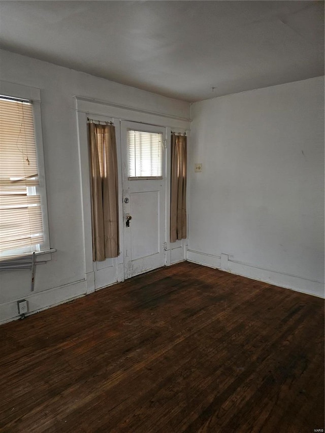 foyer with dark wood-type flooring