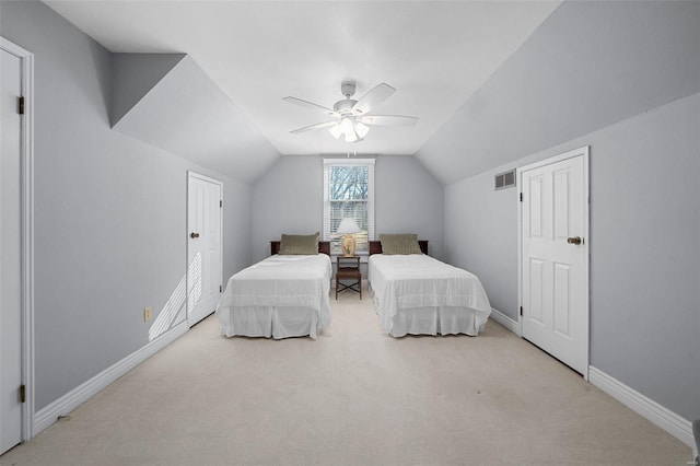 carpeted bedroom featuring visible vents, a ceiling fan, lofted ceiling, and baseboards