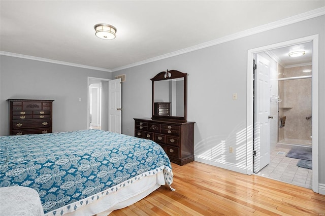 bedroom featuring crown molding and wood finished floors