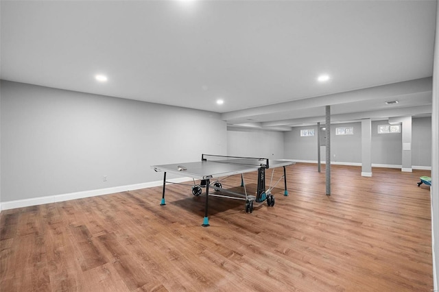 rec room with recessed lighting, baseboards, and wood finished floors