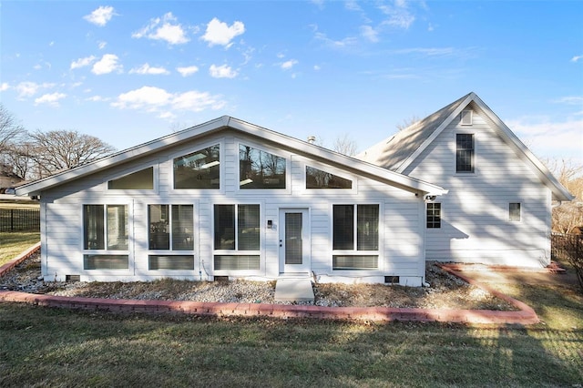 rear view of property with crawl space