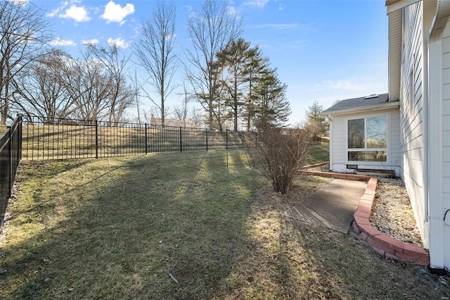 view of yard with a fenced backyard