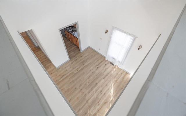 stairway with wood finished floors