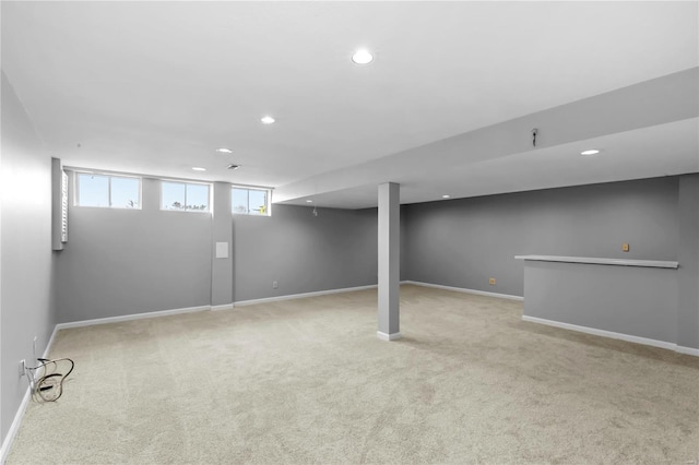 basement with light colored carpet