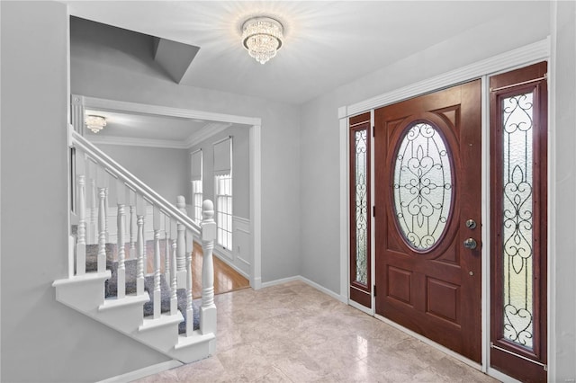 entrance foyer with ornamental molding