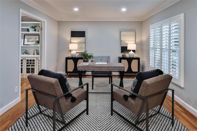 office featuring hardwood / wood-style flooring and ornamental molding