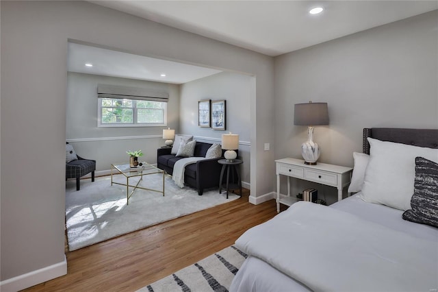 bedroom with light wood-type flooring