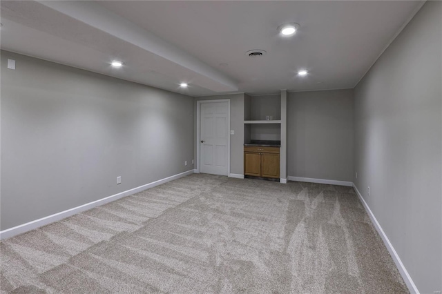 unfurnished bedroom with light carpet