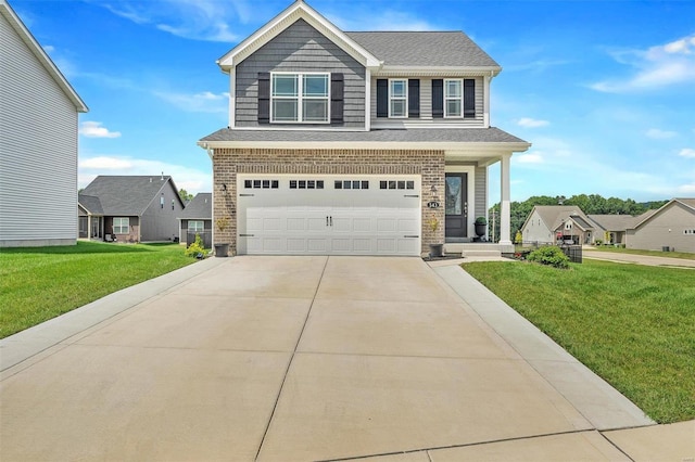 view of front of home with a garage and a front yard