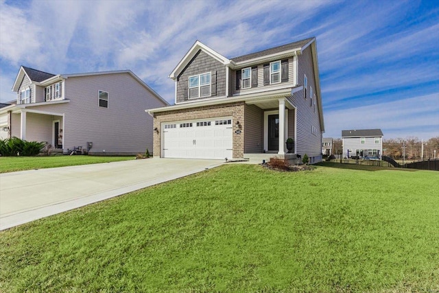 view of front of property with a garage and a front yard