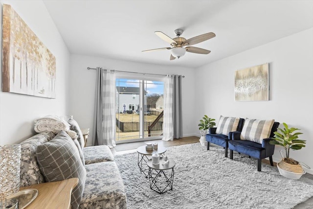 living room featuring ceiling fan