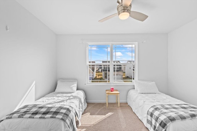 bedroom featuring carpet and ceiling fan