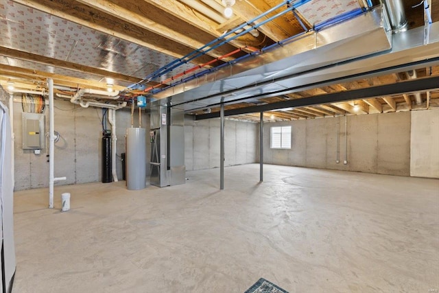 basement featuring heating unit and electric panel