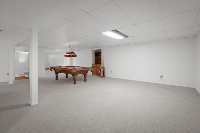 game room with a paneled ceiling, light carpet, and billiards