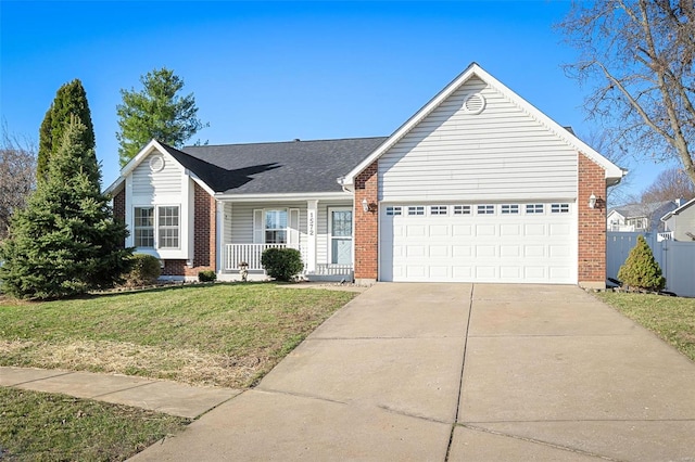 ranch-style home featuring brick siding, an attached garage, a porch, a front yard, and driveway