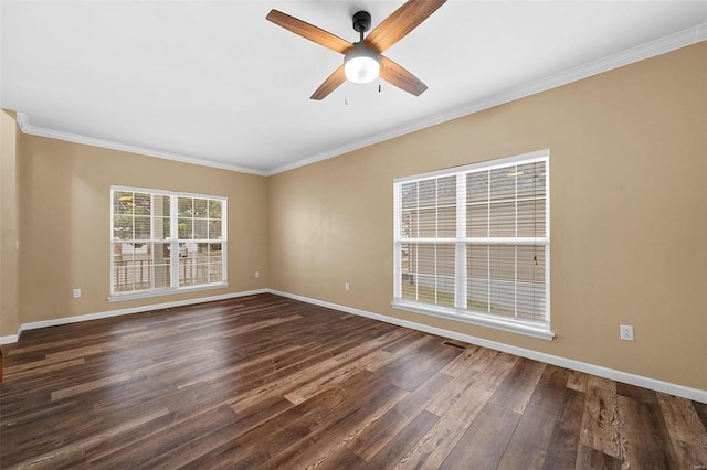 empty room featuring dark wood-type flooring, ornamental molding, and ceiling fan