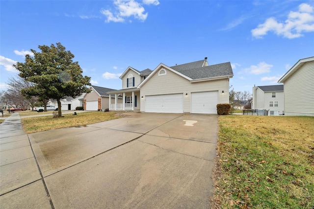 view of front of property featuring a porch, a garage, and a front lawn