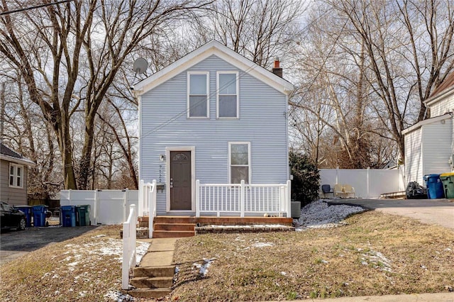 front of property featuring covered porch