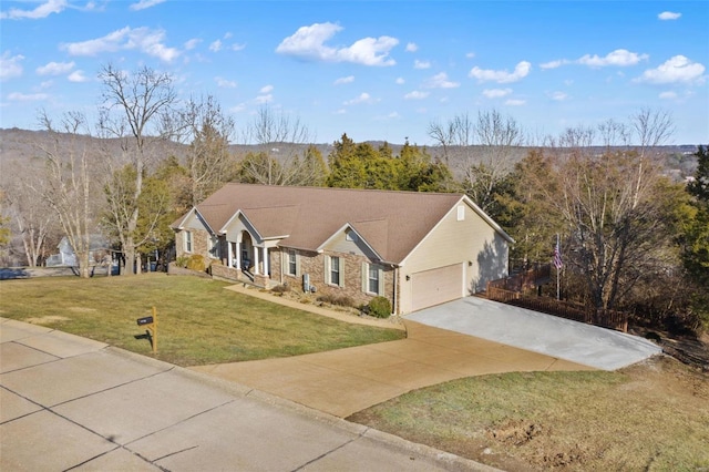 ranch-style home featuring a garage and a front lawn