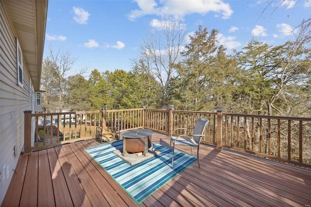 deck featuring a fire pit