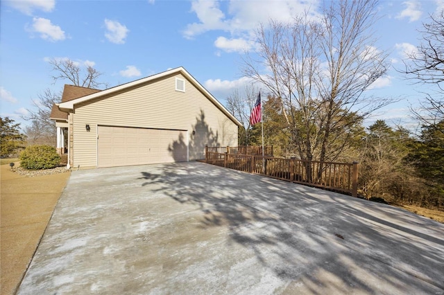 view of home's exterior with a garage