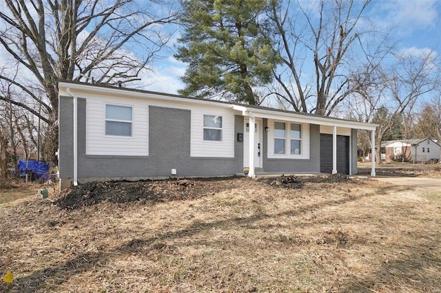 ranch-style home with a garage