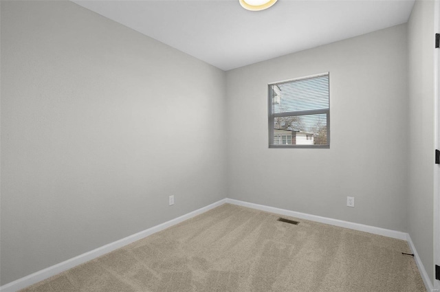 empty room with carpet flooring