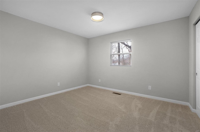 empty room with carpet floors