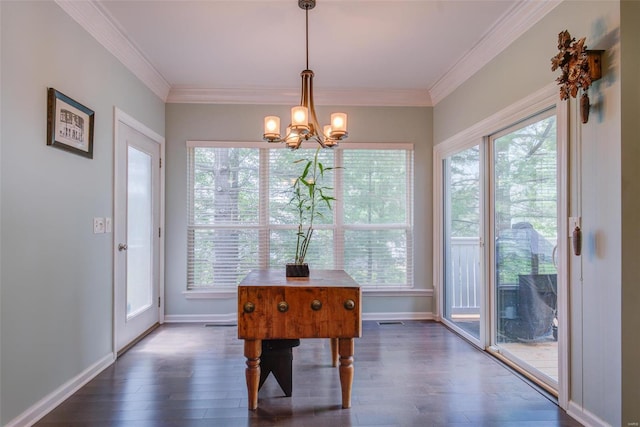 interior space with a notable chandelier, crown molding, and dark hardwood / wood-style floors