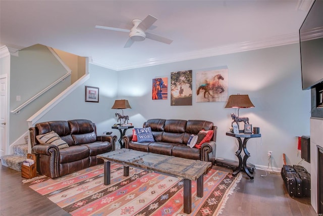 living room featuring crown molding, ceiling fan, and dark hardwood / wood-style flooring