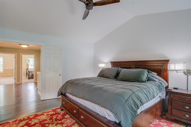 bedroom featuring lofted ceiling, hardwood / wood-style floors, and ceiling fan