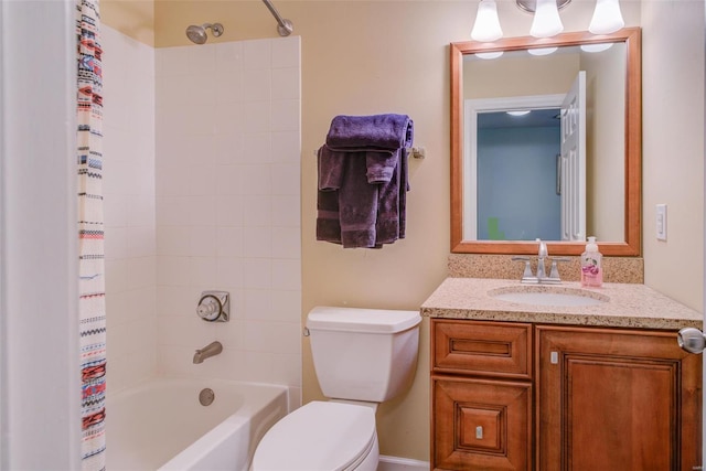 full bathroom featuring vanity, toilet, and shower / bath combo with shower curtain