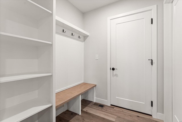 mudroom featuring light wood-style floors and visible vents