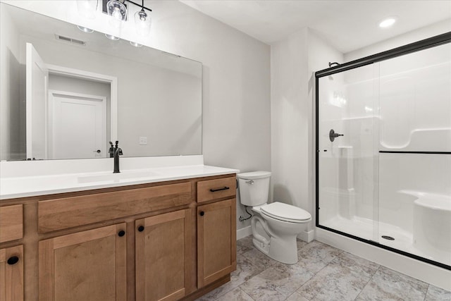 bathroom featuring a stall shower, visible vents, vanity, and toilet