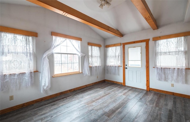 interior space featuring vaulted ceiling with beams