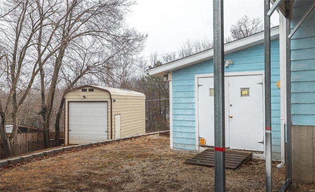 view of shed with fence